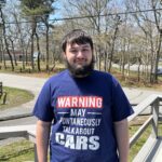 Jacob wearing his new car shirt.